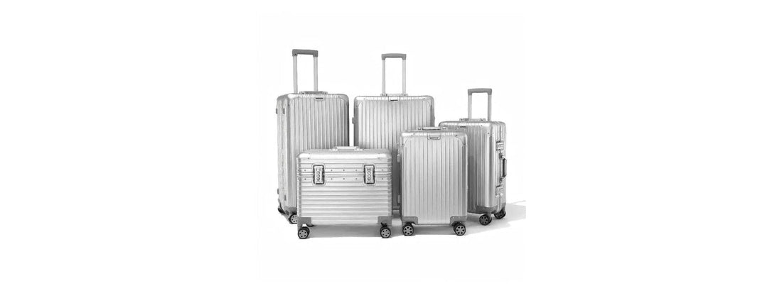 Aluminum carry-on suitcase in airport terminal for Arlo Skye vs LYVOI comparison