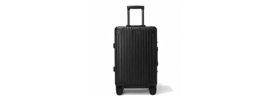 Aluminum suitcase in airport terminal for briggs riley vs aluminum luggage comparison