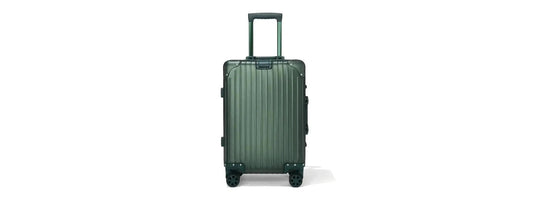24 inch aluminum suitcase in airport terminal