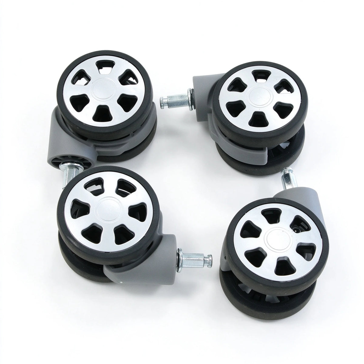 Set of 4 replacement spinner luggage wheels with silver hub caps, grey swivel housings and metal plug-in stems